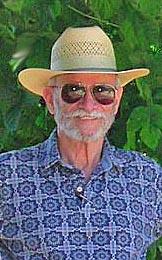 Roy Alexander, inventor of the patented Alexander Arrangement of Elements – in straw hat and sunglasses